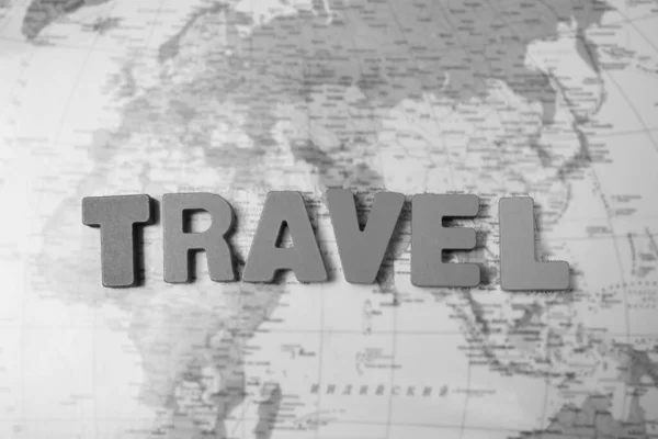 Word Travel Made Letters World Map Background Top View — Stock Photo, Image