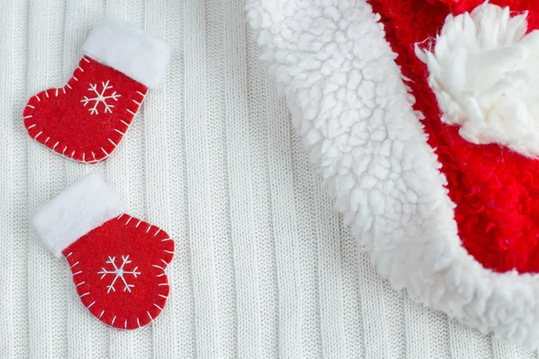 Christmas red sock and glove decorations with Santa hat