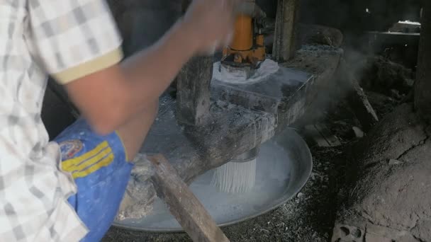 Making of rice noodles using manual pressing machine to cut rice dough into strips — Stock Video