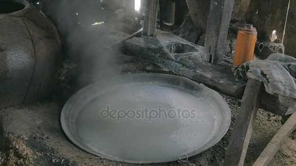 Close-up on boiling water in a steel basin for cooking rice noodles — Stock Video