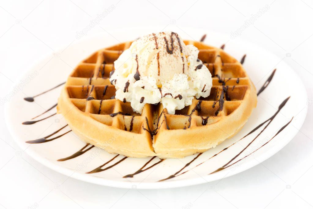 Waffle and ice cream on white dish