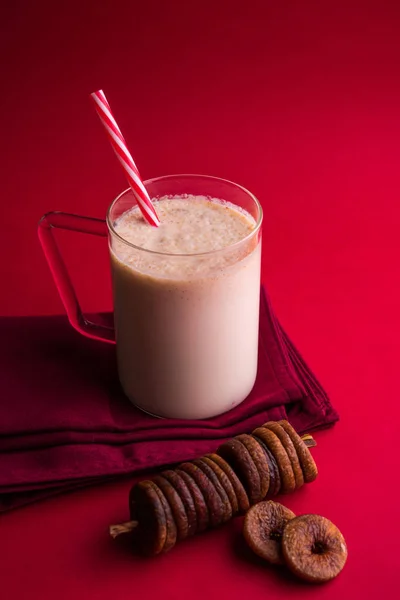 Anjeer milk shake or fig milk shake, health drink with dried figs, selective focus — Stock Photo, Image