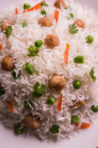 Yummy soya pulao or pilav or pulav or rice or soyabean chunk fried rice with peas and beans, indian or pakistani cuisine — Stock Photo, Image