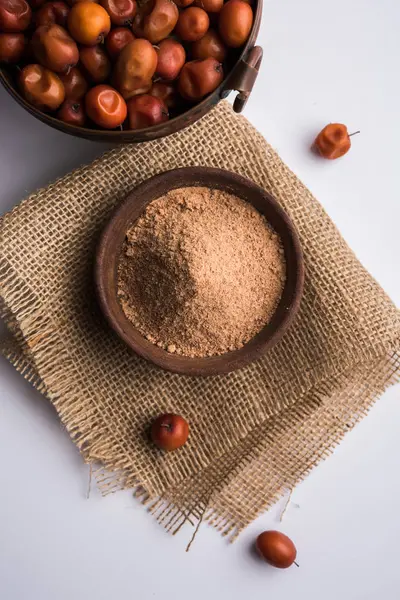 stock image Organic powder of Indian Jujube or ber or berry (Ziziphus mauritiana) moody lighting, selective focus