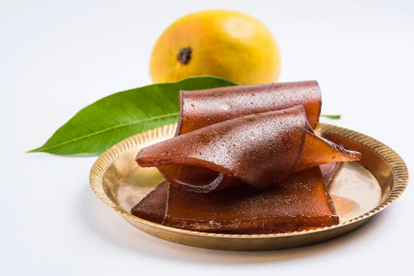 indian alphonso mango\'s dried jelly called mango papad or mango poli or slab or cake, traditional maharashtrian recipe