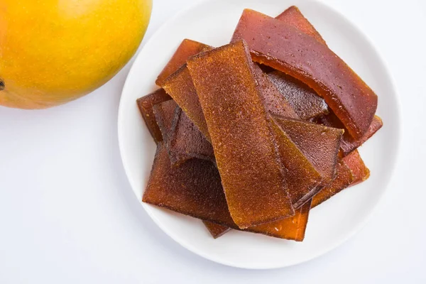 indian alphonso mango\'s dried jelly called mango papad or mango poli or slab or cake, traditional maharashtrian recipe