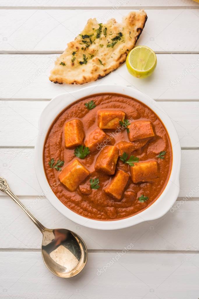 paneer butter masala or cheese cottage curry, popular indian lunch/dinner menu in weddings or parties, selective focus
