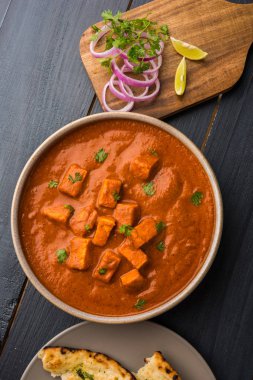 paneer butter masala or cheese cottage curry, popular indian lunch/dinner menu in weddings or parties, selective focus clipart