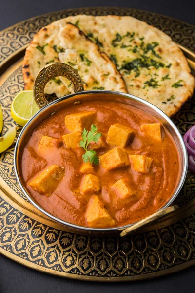 paneer butter masala or cheese cottage curry, popular indian lunch/dinner menu in weddings or parties, selective focus