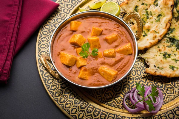 Paneer butter masala or cheese cottage curry, popular indian lunch/dinner menu in weddings or parties, selective focus — Stock Photo, Image