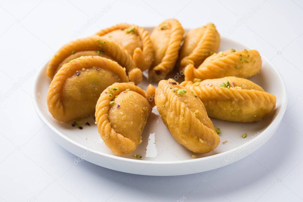 Gujiya - sweet dumplings made during the festival of holi and diwali, selective focus