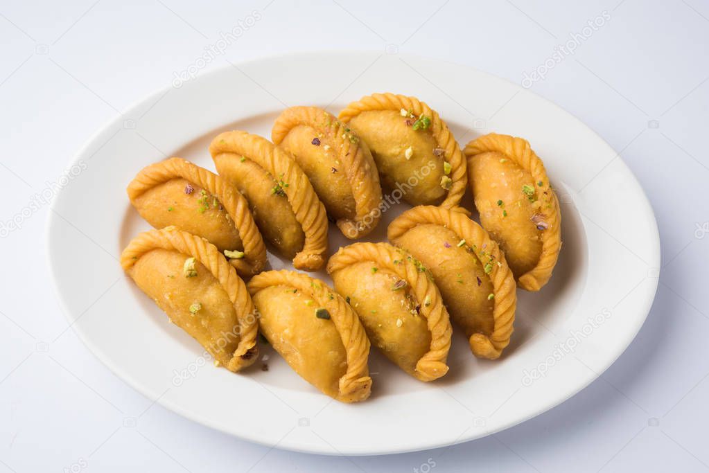 Gujiya - sweet dumplings made during the festival of holi and diwali, selective focus