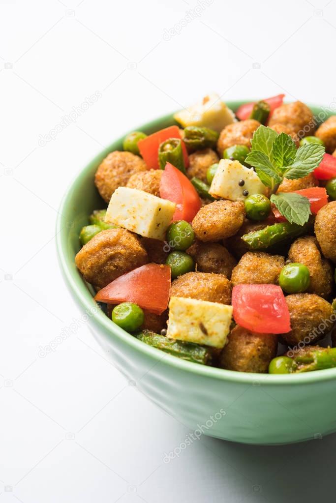 Soya chunks 65 or soya chunk fry is a healthy snack, easy to cook, protein rich, vegetarian dish ideal for starters. popular indian food. selective focus