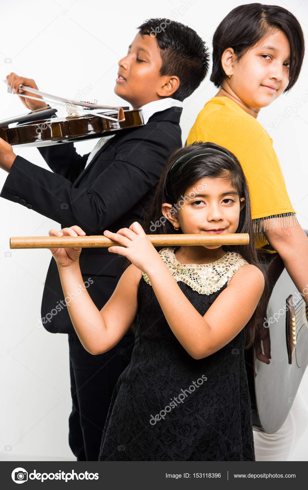 Indian Kids Performing And Singing While Playing Guitar Violin