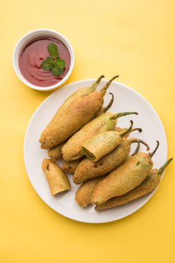 Dolma biber Pakode veya pakoda veya mirchi pakoda veya mirchi vada, son derece lezzetli ve snack ağız sulandıran Pakistan ve Hindistan halkının