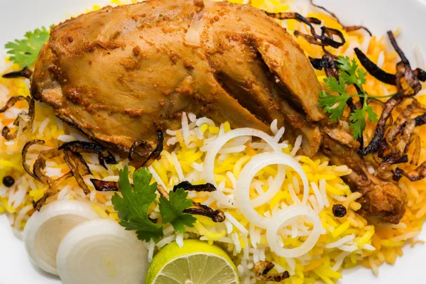 Hyderabadi Biryani is most well-known Non-Vegetarian culinary delights from the famous Hyderabad Cuisine. A traditional Indian dish made using Basmati rice, chicken meat & various other exotic spices. — Stock Photo, Image