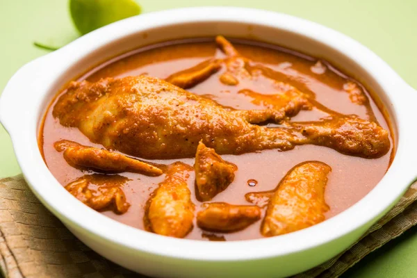 Indian spicy Chicken curry or masala chicken with prominent leg piece, popular recipe from India, selective focus — Stock Photo, Image