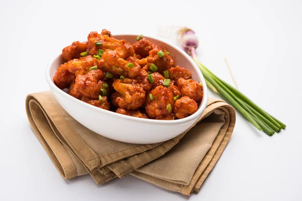 Gobi Manchurian dry - Popular street food of India made of cauliflower florets, selective focus — Stock Photo, Image