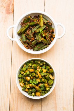 Bhindi veya bhendi veya bamya veya ladyfinger köri veya sabji, seçici odak Hint masala kızarmış