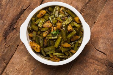 Kızarmış küme fasulyesi köri veya gawar veya gowar ki sabji, seçici odak