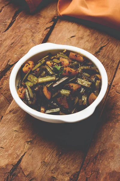 Kızarmış küme fasulyesi köri veya gawar veya gowar ki sabji, seçici odak