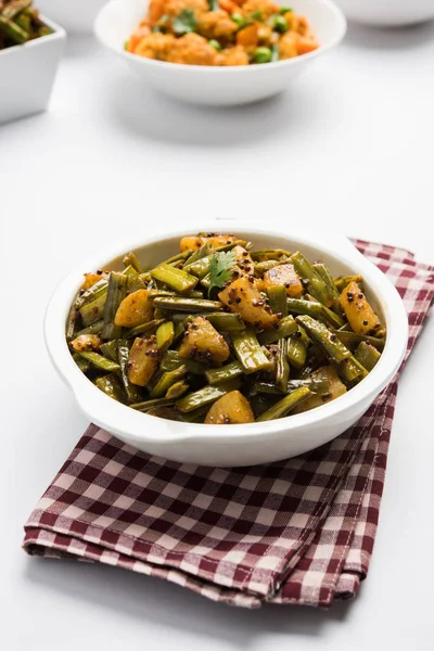 Kızarmış küme fasulyesi köri veya gawar veya gowar ki sabji, seçici odak