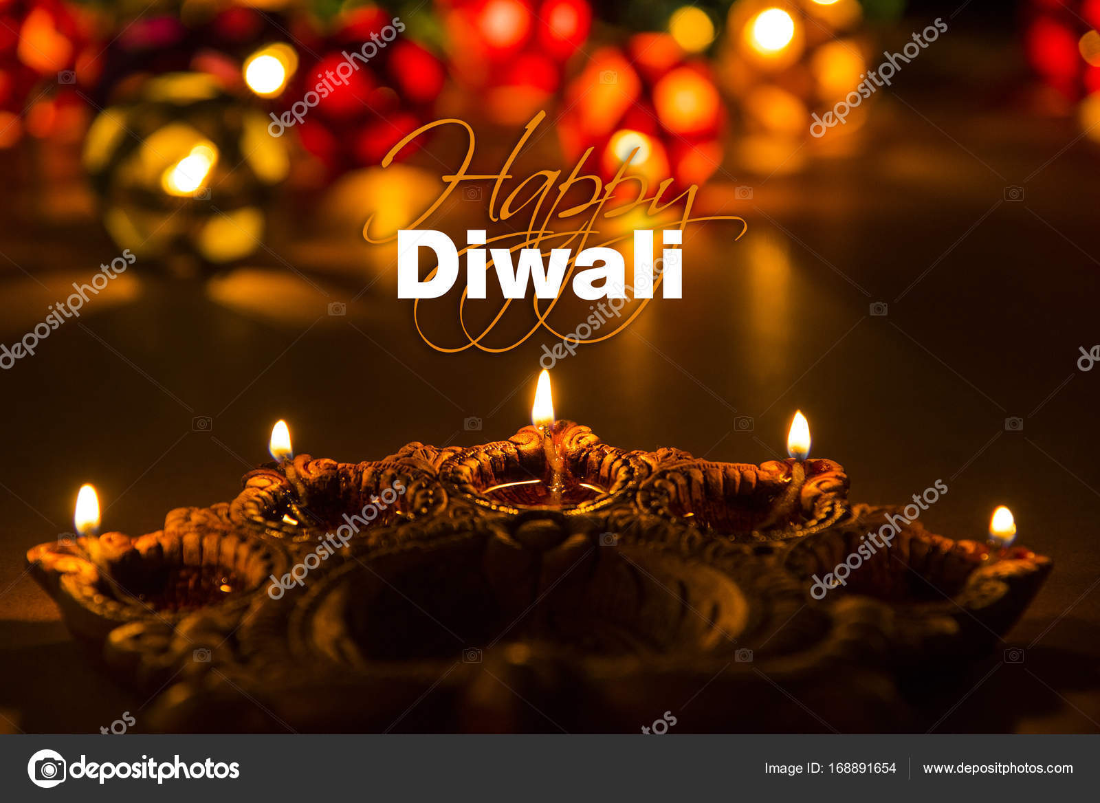 Stock photo of diwali greeting card showing illuminated diya or ...