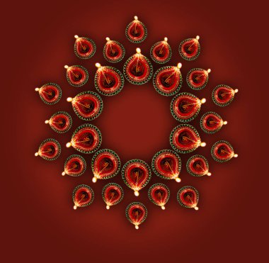 Diwali tebrik kartı üstten görünüm ışıklı diya veya yağ lambası ya da bir tasarım veya rangoli kopya alanı oluşturan panti ve mutlu bayramlar metinle gösterilen stok fotoğraf