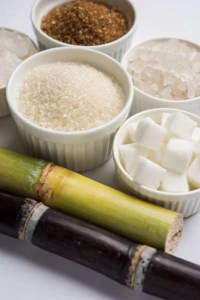 Rock Sugar crystal and cane - group photo of variety of Sugar which is a by-products of cane or ganna, selective focus