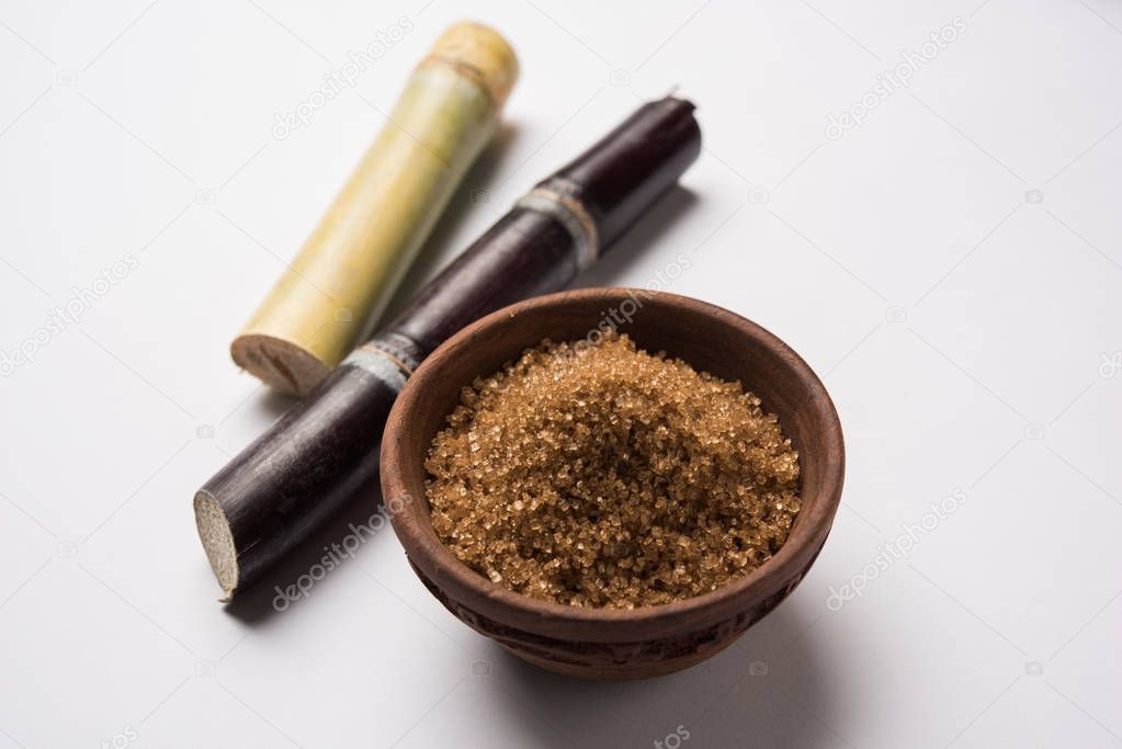 Rock Sugar crystal and cane - group photo of variety of Sugar which is a by-products of cane or ganna, selective focus