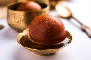 Gulab jamun /gulaab jamun is a milk-solid-based Indian sweet made in festival or wedding party clipart