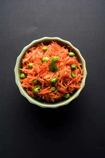 Carrot raita / Gajar  Koshimbir. It a condiment from the Indian subcontinent, made with dahi / curd together with raw / cooked vegetables Gajar / Carrot, green, peas, chilli, coriander