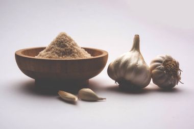 Sarımsak tozu zemin, susuz sarımsak var. Makarna, pizza ve ızgara tavuk için ortak bir baharat olduğunu.