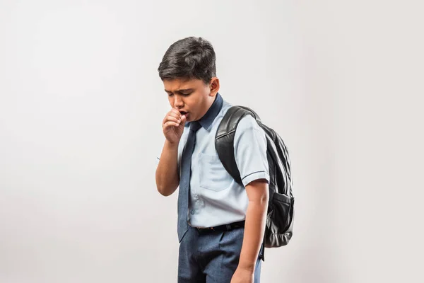 Indian School Boy Coughing While Wearing School Uniform Schoolbag Isolated — Stock Photo, Image