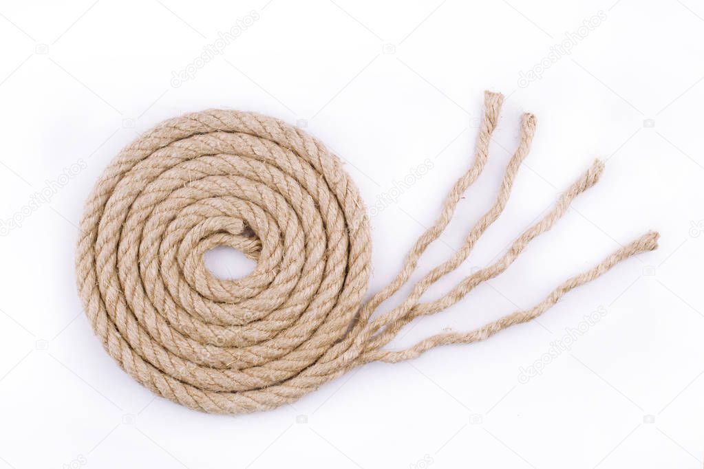 top view of rope spiral with unraveled end on white background