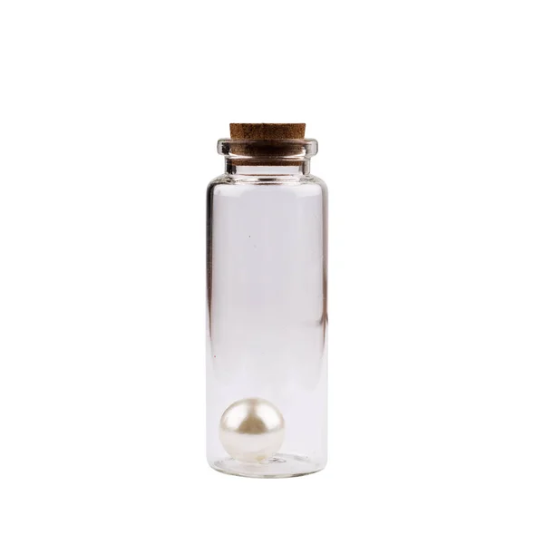 Glass jar with white pearl — Stock Photo, Image