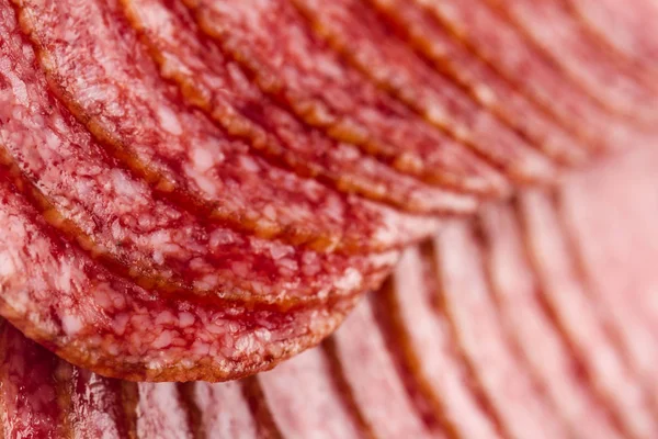 Macro detail of salami sausages slice — Stock Photo, Image