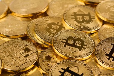 Altın bitcoins arka plan doku yığını