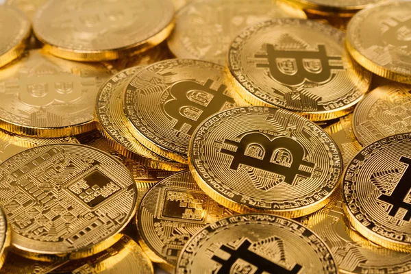 Pile of golden bitcoins background texture — Stock Photo, Image