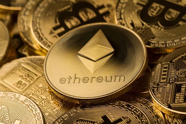 Close up of ethereum on a stack of bitcoin golden coins — Stock Photo, Image