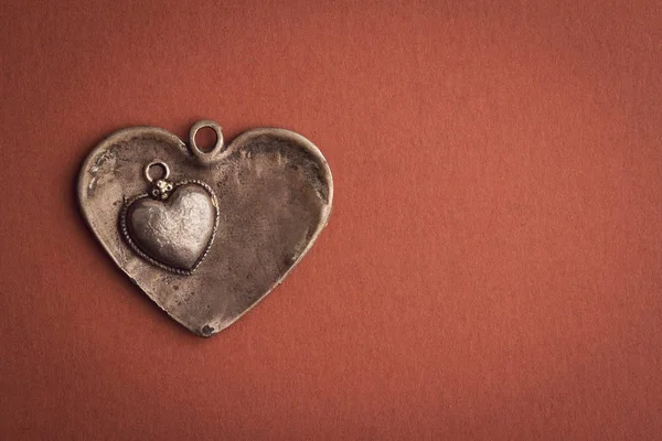 Two vintage heart shaped jewels on top of each other — Stock Photo, Image