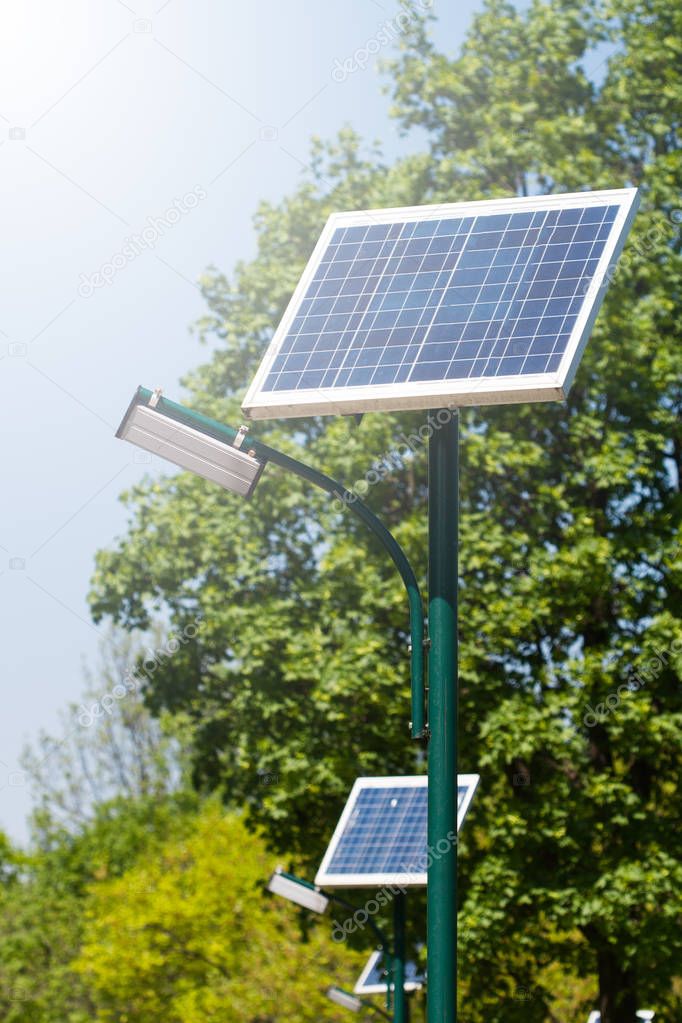 row of public illumination solar panels