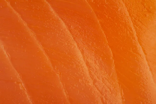 front view macro closeup up texture of red salmon meat slice background