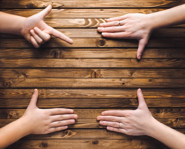 girl\'s finger points to an empty spot intended for advertising.