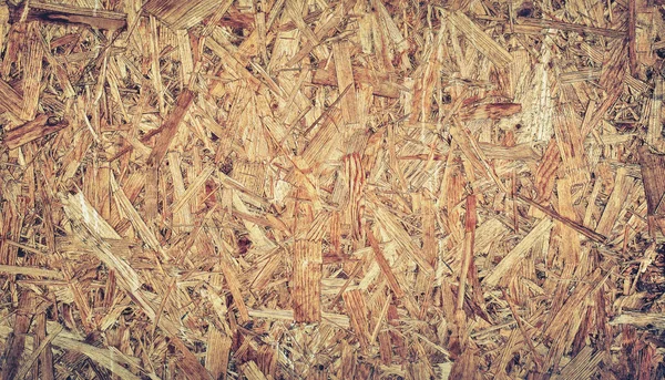 Close up pressed light brown wooden panel background, seamless texture of oriented strand board - OSB wood. — Stock Image Close Pressed Light Brown Wooden Panel Background Seamless Texture Oriented Stock Picture
