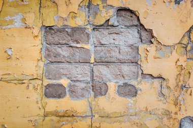 Eskimiş taş duvar dokusu. Çökmüş alçı.