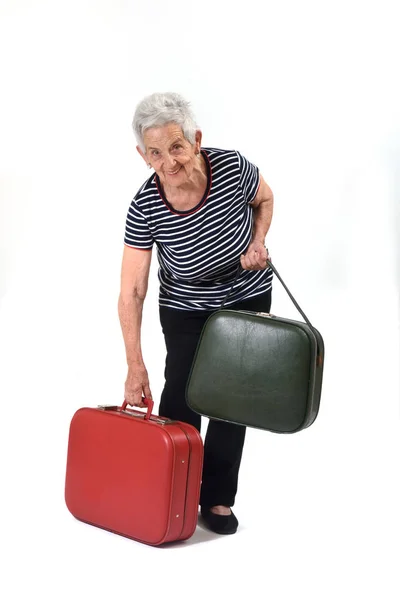 Oude dame gaat op vakantie — Stockfoto