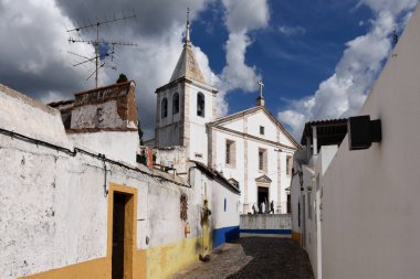 Houses and Sanctuary of the Concepcion, Vila Vicosa, Alentejo re clipart
