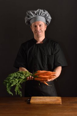 chef chopping a carrot