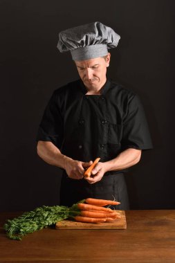 chef chopping a carrot